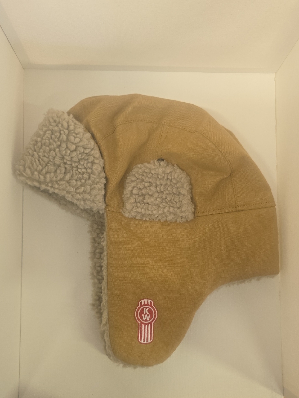 Kenworth Trademarked Tan Trapper Hat with Cotton Lining Polyester Outside